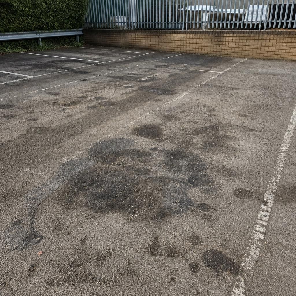 Car park surface before pressure cleaning